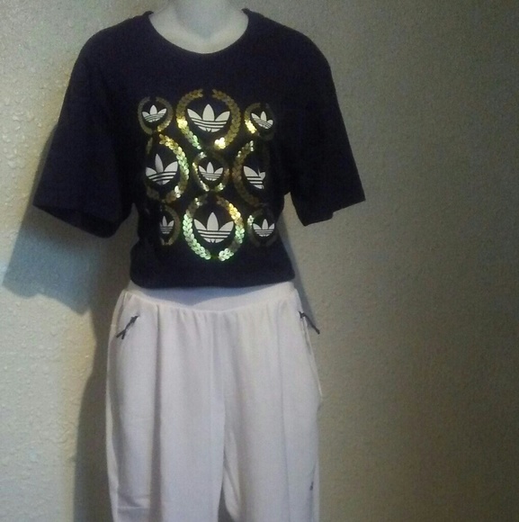 black white and gold adidas shirt